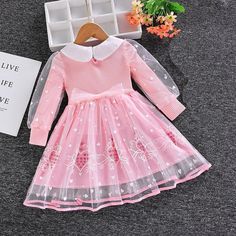 This high-quality long-sleeved Toddler Girls Elsa Dress is crafted from soft, breathable cotton and mesh, with a stylish ball gown silhouette and adorable cartoon design. Perfect for putting on a royal display at any time, this dress is designed for girls aged 2-8 years. Comfortably lightweight, the dress also features a full-length sleeve and a flattering O-neck. Let her experience the enchantment of Arendelle with this stunning Elsa dress--perfect for dress-up games with her pals! Transform yo Long Sleeve Tutu Dress For Dress-up In Spring, Long Sleeve Tutu Dress For Spring Dress-up, Cute Long Sleeve Dress For Dress-up, Cute Long Sleeve Dress-up Dresses, Sweet Long Sleeve Spring Dress, Cute Long Sleeve Dresses For Spring, Cute Long Sleeve Spring Dress, Long Sleeve Pink Dress For Dress-up, Sweet Long Sleeve Fitted Dress