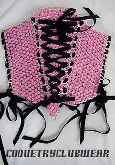 pink and black corset on white shirt