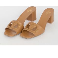 Worn Once. With Box And Dust Bag. 100% Authentic. Valentino Garavani Vlogo Cutout Slide Sandal. 2 3/4”Heel. Leather Upper Heel And Sole. Color Is Beige. Made In Italy. They Are Sadly Too Big For Me. Luxury Tan Heels For Summer, Elegant Leather Sandals With Logo, Luxury Tan Sandals For Formal Occasions, Designer Tan Sandals For Formal Occasions, Designer Tan Formal Sandals, Designer Tan Heels For Formal Occasions, Designer Tan Open Toe Heels, Designer Open Toe Tan Heels, Valentino Sandals Flats