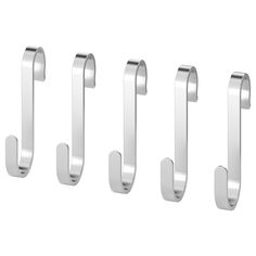 four stainless steel door handles on a white background