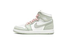 the nike air jordan 1 mid is available in white and light mint green with an orange lace