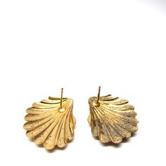 "Vintage seashell earrings, gold toned finished.post back earrings. Sea shell jewelry, nautical. Scallop shell earrings.Beach seaside jewelry, summertime bling. Size of earrings: 1\" x .75\" or 2.5 x 1.8 cm approxinately Condition: Fair. A fair amount of wear on the front. The finish is worn away a bit and tarnish on the underside. See photos above. There are no back to the posts. Would be lovely worn or re-purposed! You might like: http://www.etsy.com/listing/103610925/strawberry-purse-basket-c Gold Ocean-inspired Beach Earrings, Nickel Free Ocean-inspired Gold Earrings, Nickel Free Gold Ocean-inspired Earrings, Gold Brass Shell-shaped Earrings, Gold Shell-shaped Brass Earrings, Gold Shell With Matching Earrings, Gold Shell Drop Earrings, Ocean-inspired, Shell-shaped Gold Shell Earrings, Gold Shell-shaped Shell Earrings