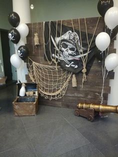 a pirate themed party with balloons and decorations