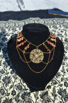 One of a kind, handmade gold and crystal necklace with carnelian, tigers eye, and citrine gemstones as well as an upcycled golden pendant. Golden Pendant, Gold Clock, Sun Goddess, Goddess Necklace, Casual Jewelry, Citrine Gemstone, Tigers Eye, Handmade Gold, Tiger Eye