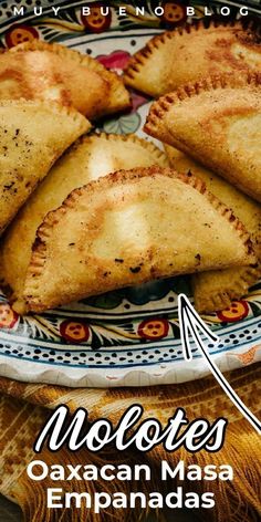 mexican empanadas on a plate with the words molotes written below