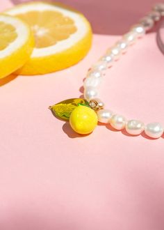 Lemon Pearl Necklace for Women, Fruit Jewelry with Stone, Cute Necklace Jewelry, Dainty Necklace, Lemon Jewelry Check out our jewelry selection for unique and custom handmade items from CharmLuckyByPelin. PRODUCT FEATURES; → Gold plated brass and murano glass necklace. → It's dainty and it can be worn daily. → Necklace length is 40 + 5 cm. 🎁 Our gift of a luck bracelet with evil eye beads is shipped with your order. ✿ Find more to here: https://www.etsy.com/shop/CharmLuckyByPelin PACKAGING: * A Lemon Jewelry, Daily Necklace, Murano Jewelry, Fruit Necklace, Murano Glass Necklaces, Evil Eye Beads, Fruit Jewelry, Fotos Ideas, Lemon Lavender