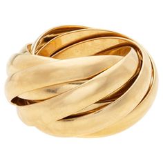 This ﻿Tiffany + Co Estate 18kt gold roller ring by Paloma Picasso is from her "Melody" collection and is absolutely gorgeous! Made of vibrant 18kt gold and substantial in weight, the piece is formed by nine interlocking bands, which together form one fabulous ring. When worn, the bands naturally overlap each other on the wearer's finger, creating an interesting visual effect. The inside of the ring is marked " Tiffany + Co", "750" and "Paloma Picasso". This fabulous ring looks beautiful when wor Tiffany Gold Ring, Gold Cartier Ring Tiffany & Co., Roller Ring, Tiffany And Co Paloma Picasso Rings, Luxury Jewelry Rings Tiffany & Co., Tiffany Atlas Rings, Paloma Picasso Jewelry, 1960s Tiffany & Co. Jewelry, Interlocking Ring