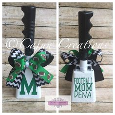 two bottles with green and black ribbon tied to them, one has a football mom on it