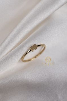 "ABOUT PRODUCT This 14K Gold Elephant Ring is beautifully designed and hand crafted with our associates to make this a special gift for your loved ones. Knowing the value of our customers, We prepare each piece with extra care and attention.  ITEM DETAILS Material: 14K Gold Approx:  1.65 gram Available colors: Gold, Rose Gold, White Gold Available Sizes: 4 US to 11 US  ✪ 14k Solid Gold ( Certification will be included with your order ) ✪Available 14K White, Yellow, Rose Gold (also in 10, 18K) 🛠 Fine Jewelry Stackable Rings As Gift, 14k Gold Jewelry With Simple Design For Gifts, Simple 14k Gold Jewelry Gift, Elephant Necklace Gold, Elephant Ring, Cute Gifts For Her, Gold Elephant, Gold Rings Stackable, Zierlicher Ring