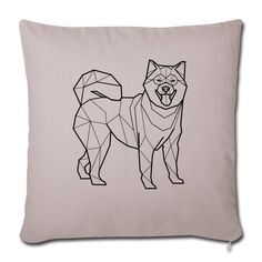 a black and white dog on a light pink pillow with the outline of an animal