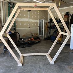 an unfinished frame in the shape of a hexagonal structure is being worked on