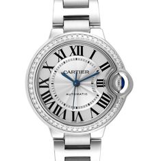 Cartier Ballon Bleu 33mm Steel Diamond Bezel Ladies Watch W4BB0016 Box Card. Automatic self-winding movement. Stainless steel round case 33.0 mm in diameter. Fluted crown set with a blue spinel cabochon. Original Cartier factory diamond bezel. Scratch resistant sapphire crystal. Silver guilloche dial wth black painted Roman numeral hour markers. Blued-steel sword-shaped hands. Minute markers around an inner ring. Stainless steel bracelet with a hidden butterfly clasp. Fits a 6 3/4" wrist. Cartier Diamond Watch With Polished Finish, Round Cartier Diamond Watch With Polished Finish, Anniversary Diamond Watch With Date Indicator, Anniversary Diamond Watch With Chronometer, Cartier Round Watch With Date Indicator, Blue Spinel, Cartier Ballon Bleu, Patek Philippe Aquanaut, Rolex Air King