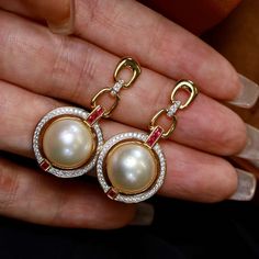 --- SPECIFICS --- 💚Materials: 100% Natural High Quality Seawater Mabe Pearl With 24k gold plated s925 Sterling silver 💚-The Mabe Pearl is 100% natural UNTREATED , UNHEATED, UNDYED Mabe Pearl- 💚Metal: Real 24k Gold plated s925 Sterling Silver 💚Pearl Diameter: 17mm*35mm 💚Closure: the closure is made of 925 Sterling Silver.  💚Handmade Artwork, original design and copyright protected💚 These stunning gold plated silver earrings feature a beautiful pair of hemisphere Mabe Pearl stones. With the Fake Mabe Pearl Earrings, Elegant Gemstone Clip-on Earrings For Anniversary, Formal Gemstone Bridal Earrings, Round Shape, Formal Round Gemstone Bridal Earrings, Formal Bridal Earrings With Round Shape, Exquisite Evening Bridal Earrings, Formal Round Bridal Earrings, Exquisite Round Pearl Drop Earrings, Round Pierced Pearl Earrings For Formal Occasions