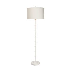 a white floor lamp on a white background