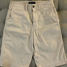 Brand New American Eagle 12 Inch Inseam Khaki Shorts. Lighter Khaki Color. 15 Inches Across The Waist. All Measurements Are Taken Approximately And While Laying Flat. Khaki Cotton Shorts With Short Inseam, Casual Knee-length Khaki Shorts, Beige Knee-length Cotton Shorts, Beige Cotton Knee-length Shorts, Casual Beige Bottoms With Short Inseam, Classic Knee-length Cotton Bermuda Shorts, Beige Cotton Short Length Bottoms, Beige Cotton Short-length Bottoms, Beige Cotton Short Length Pants