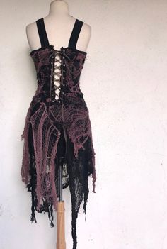 Ready to Ship! Will Fit - Bust - 33' - 36' Waist - 23' - 27' Hips - 34' - 38' Length - 25' - 37' All hand cut and hand stitched together The Webbing -Hand dyed brown -Black Made with creepy cloth which is made of cotton All hand cut and hand stitched to create a webb like affect The under dress is made of black rayon and is soft and stretchy On the back is handmade corset with silver eyelets and brown ribbon Dress has rough edges and strings hanging. This is part of the design HAND WASH COLD AND Ripped Dress Drawing, Ripped Dress Aesthetic, Ripped Dress Outfit, Joro Spider, Creepy Dress, Shredded Dress, Punk Dresses, Torn Dress, Black Denim Jacket Men