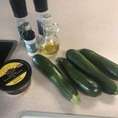 cucumbers and other ingredients on a counter top