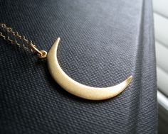 *vermeil crescent moon charm in satin gold finish-31x10mm *14k gold filled delicate cable chain-choose from 16,18 or 20''long. Everyday Gold Crescent Charm Necklace, Gold Crescent Moon Charm Necklaces, Everyday Gold Half Moon Necklace, Gold Crescent Moon Necklace, Crescent Moon Necklace Gold, Gold Crescent Moon, Crescent Moon Necklace, Gold Moon, Moon Charm