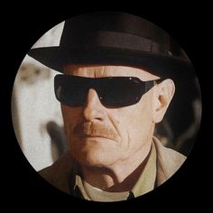 an old man wearing sunglasses and a hat in a circular photo with a black background