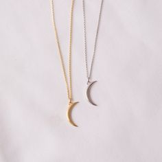 "This Reel Gold Crescent Moon Necklace, 14K Solid Gold Dainty Gold Moon Pendant, Delicate Two Sided Moon Necklace Modern and delicate. You can layer it up and show your awesome personal style! Moon sign symbolizes love, consistency, and eternity. These elegant and timeless moon necklaces are hand-made with much love and care, just for you. This necklace consists of a beautiful 3D, minimalist crescent moon charm fastened to a dainty, delicate chain D E T A I L S Material: * 100% 14K(585) Real Gol Crescent Moon Charm Necklace For Anniversary, Minimalist Moon Shaped Jewelry For Anniversary, Minimalist Moon-shaped Jewelry For Anniversary, Anniversary Crescent Moon Charm Necklace, Minimalist Moon Shaped Necklace For Anniversary, Minimalist Moon Necklace For Anniversary, White Gold Half Moon Jewelry For Gift, White Gold Half Moon Jewelry Gift, Half Moon Phase Necklace For Anniversary