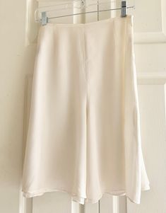 A clean and elegant silhouette, silk crepe de chine underlayer with silk georgette overlayer. High rise, contoured waist with center back zip. Color Ivory, size 10. Waist 29" circumference, 8" inseam, garment length 22". Silk Shorts, Silk Crepe, Color Ivory, Short Outfits, Double Layer, 20 Cm, Womens Shorts, Silk, Clothes For Women