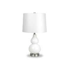 a table lamp with a white shade on the base and a light bulb attached to it