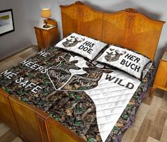 a bed with two deer bedspreads on top of it and the words, this is her buck