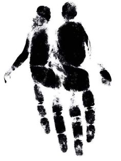 an image of two people holding hands in the shape of a handprint on a white background