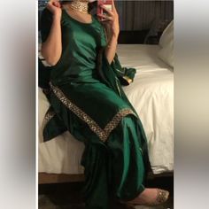 Great Condition, Only Wore Once! Fits Size Small And Medium -Silk Material Green Silk Palazzo Set With Dabka Work, Green Semi-stitched Silk Palazzo Set, Green Silk Sets With Gota Work, Silk Palazzo Set With Mirror Work, Bollywood Silk Palazzo Set For Festivals, Green Silk Palazzo Set With Mirror Work, Elegant Green Palazzo Set With Traditional Drape, Green Silk Dress With Gota Work, Silk Eid Dress With Gota Work