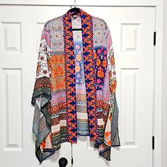 Rachel Zoe Multi-Color Floral Sheer Open Front Tunic Cardigan Shawl Blue, Orange, Teal, Pink, Yellow, White, Green Loose Fit Spring Summer Bathing Suit Cover Womens Size: One Size New Condition: New With Tags Multicolor One Size Open Front Outerwear, Multicolor Cardigan For Vacation, One Size Multicolor Open Front Outerwear, Orange Open Front Cardigan For Spring, Multicolor Open Front Outerwear, Bohemian Orange Outerwear For Summer, Multicolor Open Front Cardigan For Spring, Multicolor Fall Cardigan For Vacation, Casual Orange Outerwear For The Beach