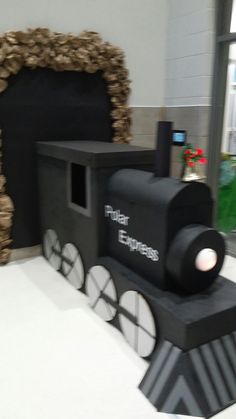 there is a fake train on display in the room