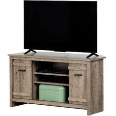 an entertainment center with a flat screen tv mounted on it's sides and drawers