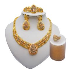 Dubai Gold Color Jewelry Sets For Women Dubai African Jewelry Set Bride Earrings Rings Nigerian Wedding Jewelery Set Metals Type: Copper Alloy Style: TRENDY Model Number: 3256802904859335 Included Additional Item Description: necklace earrings ring bracelet Occasion: Party Shape\pattern: Round Gender: Women Material: Metal Fine or Fashion: Fashion Jewelry Sets Type: Necklace/Earrings/Ring/Bracelet Item Type: Jewelry Sets Festive Hand-set Gold-plated Jewelry Sets, Gold-plated Costume Jewelry Sets, Arab Gold Jewelry Set, Nigerian Jewelry Sets, Nigerian Necklaces, Bride Jewelry Set, Wedding Jewelery, African Bride, Bride Earrings