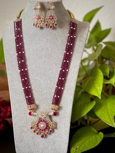 An elegant set for your local gatherings or parties. The length of the Pendant necklace is given in one of the pictures. Measurements of the jhumkas. Height: 6 Cm  Width : 3 Cm  Care Instruction : Avoid Heat & Chemicals Like Perfume, Deo, Alchol, Etc. | Clean With Dry Cotton Cloth | Pack In our Anti tarnish box after use. Festive Dual-tone Bridal Necklace For Diwali, Dual-tone Jewelry Sets For Diwali, Bollywood Dual-tone Jewelry Sets For Festivals, Dual-tone Bridal Necklace For Festive Occasions, Bollywood Style Dual-tone Jewelry Sets For Festivals, Dual-tone Bridal Necklace For Festive Occasions And Festivals, Festive Dual-tone Bridal Necklace For Festivals, Dual-tone Kundan Bridal Necklace For Celebration, Dual-tone Jewelry Sets For Diwali Celebration