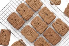 some cookies are on a cooling rack and ready to be baked into the ovens