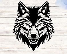 an image of a wolf head on a wooden background