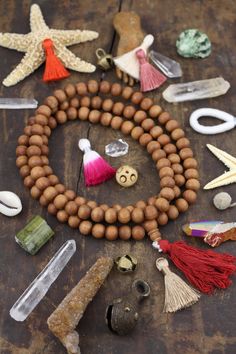 "10mm Sandalwood Beads : 108 Aromatic beads, Natural Authentic Indian Brown Sandalwood, Yoga-Inspired Jewelry Making, Mala, Fragrant Scent ✨The Magic is in the Details✨ Approx. Bead Size: 10mm Approx. Hole Size: 1.5+mm Number of beads: 108 Approx. Strand Length: 38\" Material: Sandalwood If you're inspired by the smells of the silk road, these Sandalwood beads will delight your senses! These beautiful beads are made from Sandalwood, which smells heavenly- very woodsy and earthy, with a light spi Spiritual Wooden Beaded Bracelets, Holistic Healing Mala With Wooden Beads, Holistic Wooden Beaded Bracelets For Meditation, Natural Wooden Beads Spiritual Bracelet, Holistic Brown Mala With Wooden Beads, Brown Polished Beads Mala For Meditation, Brown Wooden Beads Spiritual Mala, Spiritual Brown Wooden Beads Mala, Holistic Brown Mala With 108 Beads