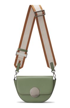 Gleaming logo hardware and rich leather distinguish a structured saddle bag that comes two straps—one webbed, one leather—for styling versatility. Magnetic-snap flap closure Removable, adjustable webbed shoulder strap; removable, adjustable leather crossbody strap Exterior zip pocket Structured silhouette with flat base for stability Lined Leather Imported Designer Leather Shoulder Bag With Logo Strap, Green Leather Crossbody Saddle Bag, Modern Rectangular Saddle Bag With Branded Hardware, Modern Shoulder Bag With Logo Strap And Top Handle, Green Leather Flap Bag, Trendy Leather Flap Bag With Detachable Strap, Modern Leather Shoulder Bag With Logo Strap, Green Crossbody Bag With Logo Strap, Modern Rectangular Shoulder Bag With Logo Strap