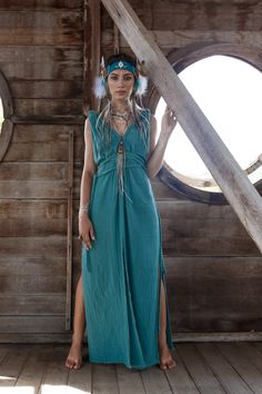 Tribal Green Boho Dresses for Women can be seen as a piece of art connecting with nature. A wild elegant woman seeking adventure is to truly set free in this stylish. The Braids of this turquoise bridesmaid dress form its shape, you can play around and change the style and sizing so it can be a plus-size dress as well. SIZING One size adjustable with braids size fits XS / S / M / L Here is the instruction how to do braids of this dress: https://youtu.be/CCRGkrKOR_c Here is a brief instruction ho Turquoise Maxi Festival Dress, Bohemian Turquoise Maxi Dress For Summer, Bohemian Sleeveless Turquoise Dress, Turquoise Bohemian Maxi Dress, Turquoise Sleeveless Bohemian Dress, Turquoise Bohemian Dress For Vacation, Turquoise Boho Dress For Vacation, Turquoise Bohemian Boho Dress For Summer, Flowy Bohemian Turquoise Dress