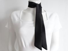 Unisex black satin scarf / sash for a fashionable modern style. Say hello to your new hair obsession.  Many wearable variations such as hair scarf, wrist scarf, sash belt, neck scarf, purse or hat scarf... Wrap around a low / high hair bun, ponytail or twine in a stylish braid.   Add a bowknot neck scarf or a satin sash belt to accessorize your outfit for that unique finishing touch.  A must-have versatile scarf that is a perfect statement accessory for any social event, wedding or everyday casu Formal Solid Color Satin Scarves, Elegant Black Silk Scarf For Party, Elegant Black Tie Scarf, Chic Solid Color Formal Scarves, Elegant Black Silk Party Scarf, Classic Black Neckwear For Party, Chic Black Satin Silk Scarf, Classic Black Party Neckwear, Elegant Black Satin Silk Scarf