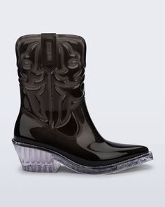 Side view of a black Texas boot with pointed toe and clear sole. Cowboy Vibes, Come And Take It, Larger Than Life, Trending Boots, Cowboy Boot, The Festival, Cultura Pop, Cowboy Boots, Heel Height