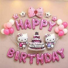 hello kitty birthday decorations and balloons on a wall with the words happy birthday written in pink