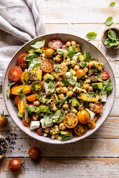 a bowl filled with lots of different types of vegetables