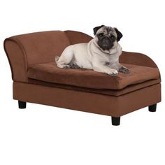 a small pug dog laying on top of a brown couch cushion in front of a white background