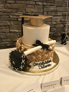 there is a cake on the table with congratulations written on it