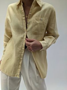 Classic summer linen blouse is a butter yellow. Blouse has button closures up the front, a collared neckline and a single pocket at the chest. Tag reads Studio Works There is a very faint spot at the center back body - not noticeable unless inspecting for flaws. Pale Yellow Clothes, Spring Flax Button-up Shirt, Yellow Summer Blouse With Pockets, Yellow Blouse With Pockets For Summer, Spring Daywear Shirt With Buttoned Pockets, Classic Long Sleeve Flax Tops, Yellow Blouse With Pockets, Classic Linen Blouse For Day Out, Classic Daywear Blouse With Buttoned Pockets