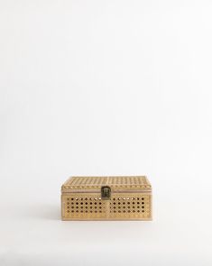 a wooden box sitting on top of a white surface