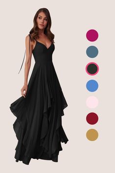 a woman in a long black dress with different colors