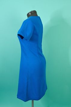 "Vintage 1960s 1970s Large Blue Mini Dress Tunic style neckline Ribbed like texture horizontal pattern Zips up the back Measurements are seam to seam relaxed to MAX stretch over the fullest part of the best, waist and hips Shoulder to shoulder: 15\" Bust: 36\" - 42\" Waist: 34\" - 38\" Hips: 42\" - 46\" Length: 37\" Zipper: 21.5 Labels/Materials: No labels - Polyester knit - Metal Zipper Excellent vintage condition, a few small snag of fabric" Blue Fitted Mod Mini Dress, Beach Dresses Short, Paisley Print Dress, Cap Dress, 60s Dress, Green Floral Dress, Tunic Style, Dress Tunic, Blue Mini Dress