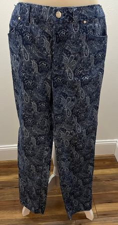 a woman's pants with paisley print on it